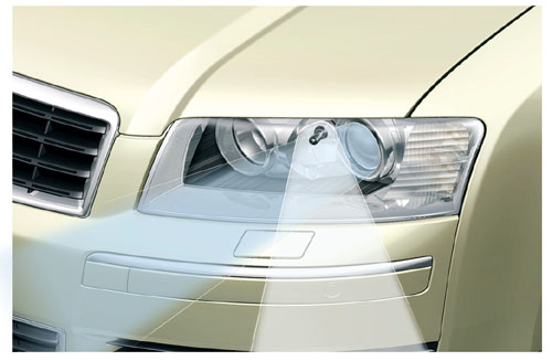 Adaptivní světlomety Audi A8 výrazně zvyšují osvětlení bokem ležících míst a usnadňují couvání v noci.